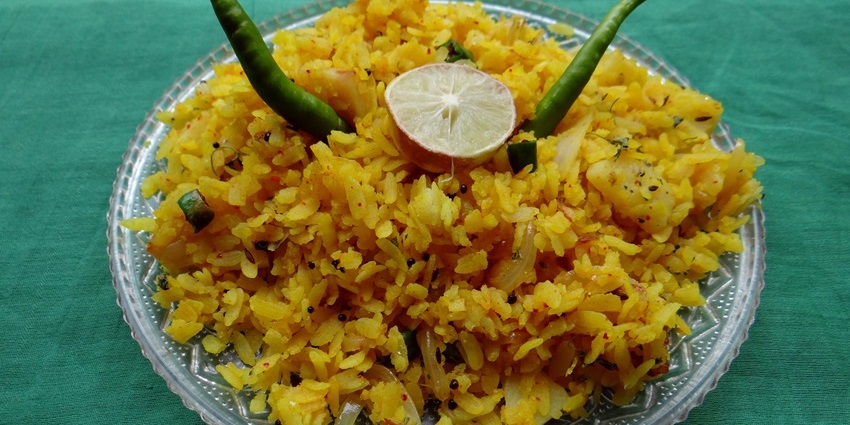 A plate of poha decorated with green chillies, on the list of best street food in Kota