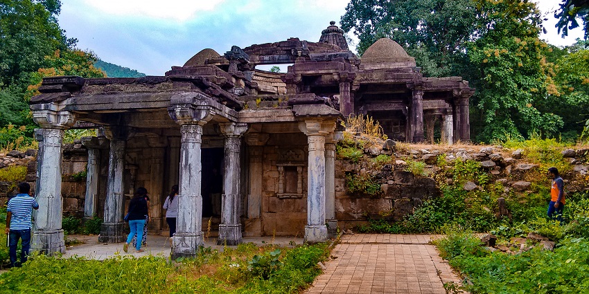 Ancient Jain temple in Polo Forest, showcasing intricate architecture and lush surroundings