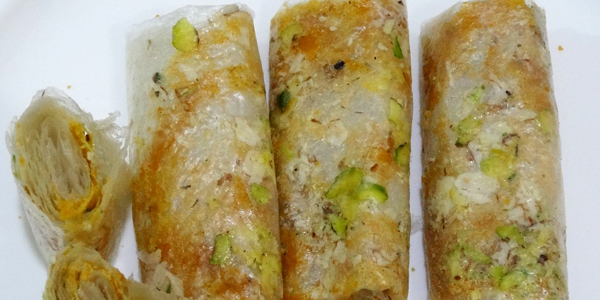 Try the tasty Pootharekulu, an Andhra sweet which is a street food in Rajahmundry.