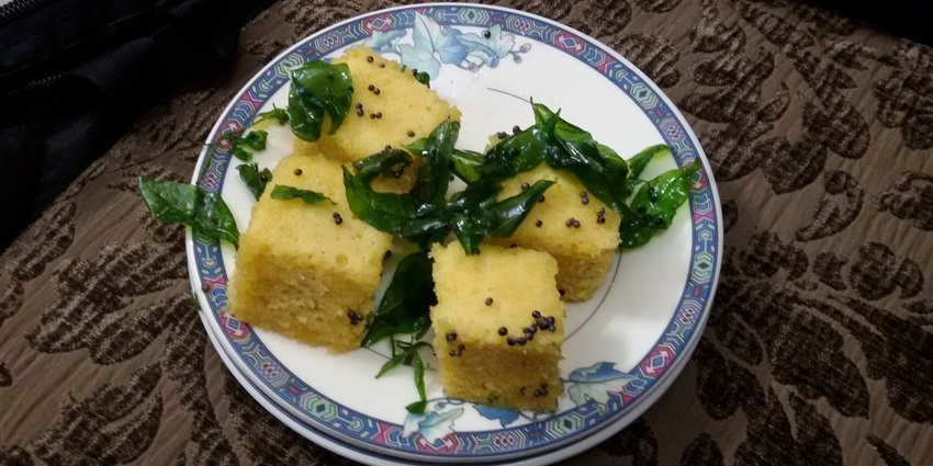 Prabhas Patan Food Market vendors selling traditional snacks like dhokla and spicy chaat