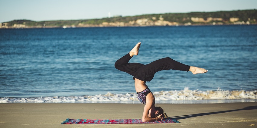 Enjoy relaxing yoga for a rejuvenating experience with mesmerising views of the beach.