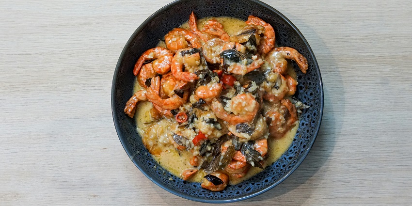 Delicious prawn curry served on plate - Kerala style prawn is one of the best food in Kerala.