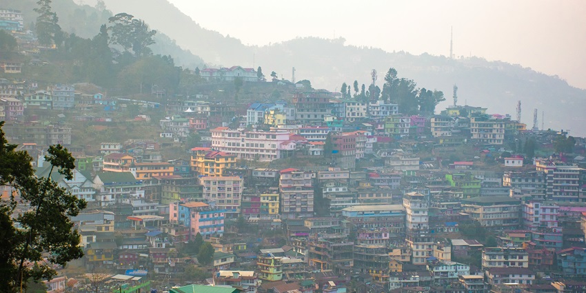 A photograph of Kohima city captured from Puliebadze, offering breathtaking views.