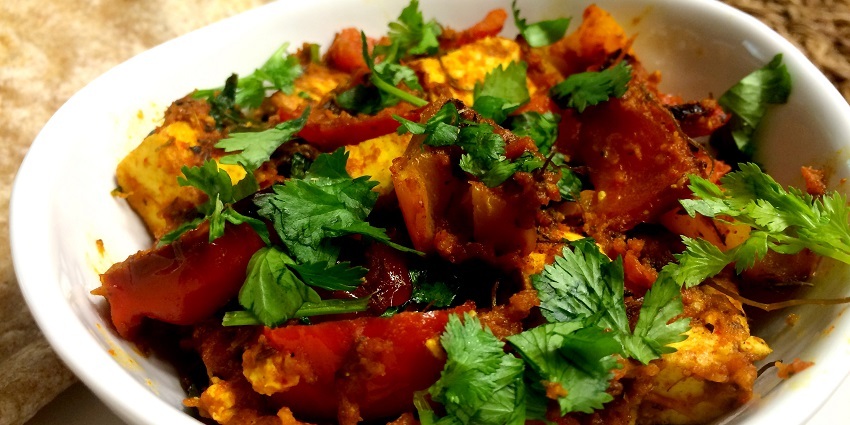 People eat delicate and spicy kadhai paneer, one of the very delicious dishes