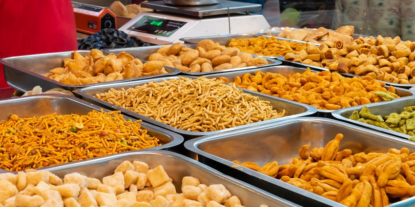 Purani Mandi is a vibrant street offering local spices, sweets, and delicious cuisines.