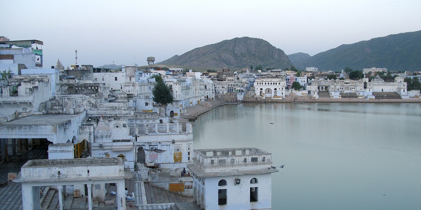Panoramic view of the scarred Pushkar lake and the Pushkar Bharam Ji Temple in Rajasthan
