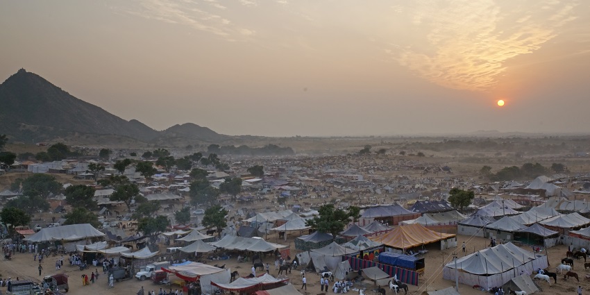 Pushkar Fair showcases Rajasthani folk music, trade, and vibrant festivities.
