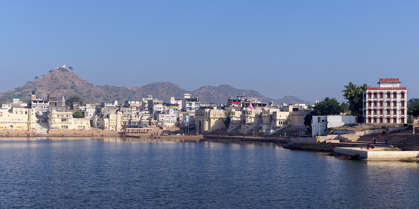 Scenic ghats lining Pushkar Lake, where pilgrims perform religious rituals and take dips.