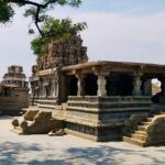 Exterior view of Kamakshi Vaidyanatha Temple in Pushpagiri, showcasing its architectural details.