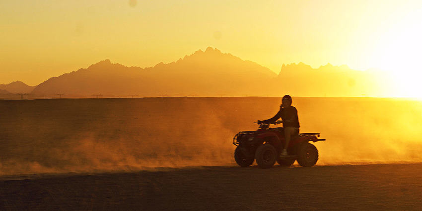 Thrill of quad biking across the Thar Desert's golden dunes in the Desert safari in Jodhpur