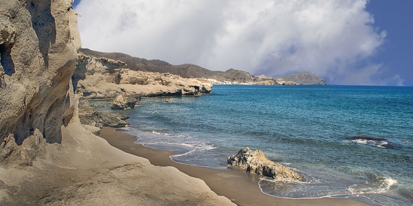 Sandy shoreline with the clear water of Quynh Phuong Beach, a beautiful beach near Hanoi.