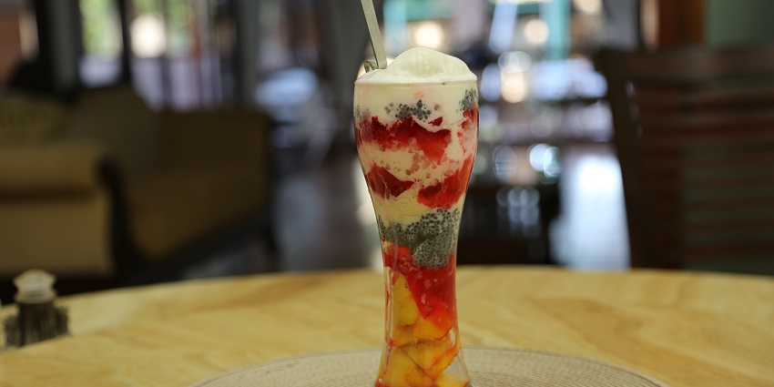 Image of Rabri Falooda served in a fancy glass with colourful ice cream and fruits