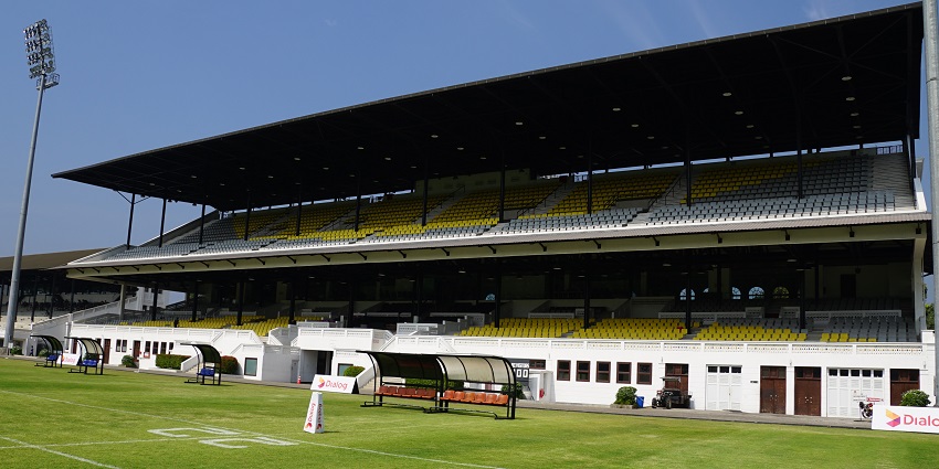Scenic image of the Race Course Ground and its pavilion surrounded by the lush greenery