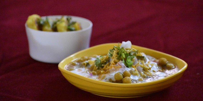 Tasty and mouth-watering Ragda Pattice-chickpea spicy curry with potato patties is one of the best street foods in Surat.