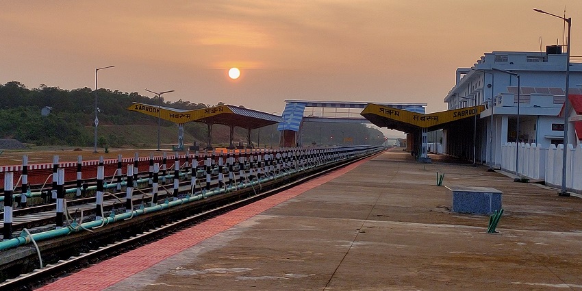 Sabroom Railway Station in Tripura surrounded by lush greenery and backdrop beautiful sunset.