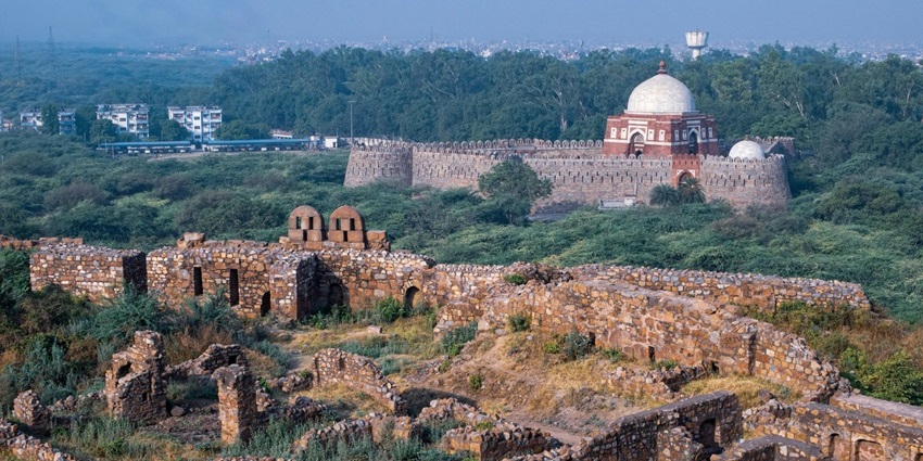 View of the Raja Karna Ka Kila standing amidst lush greenery, a tourist spot for history lovers