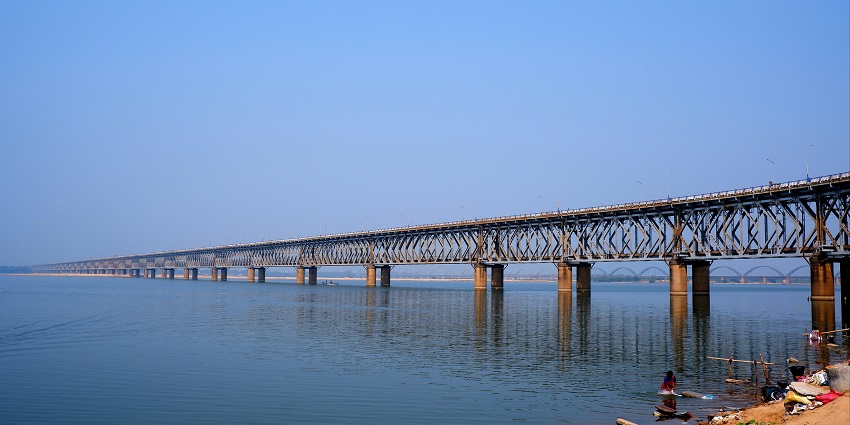 A long bridge elegantly standing over serene waters in Rajahmundry in Andhra Pradesh.