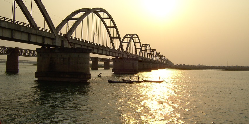 A panoramic view of Rajahmundry, showcasing the Godavari River flowing under the iconic bridge