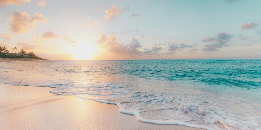 A breathtaking vista of the serene Rajbagh Beach, a famous tourist destination in Goa.