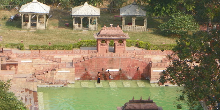 Rajgir Hot Springs also known as Surajkund with steps leading to the water.