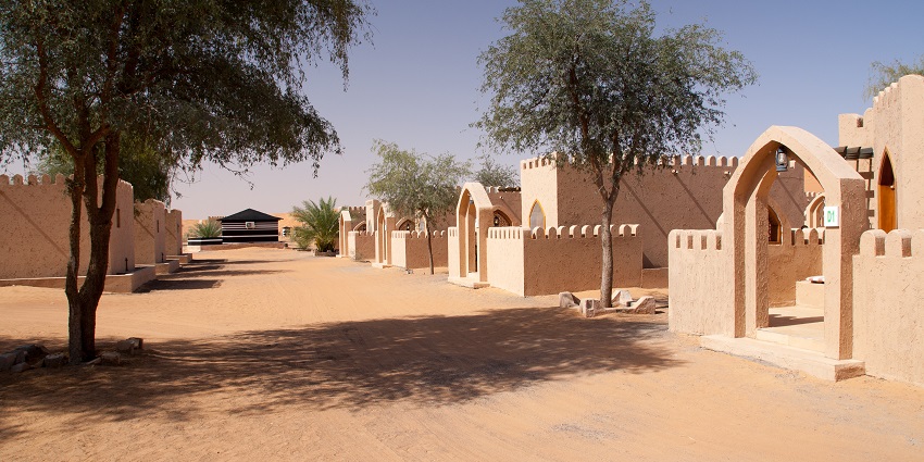 Rajputana Desert Camping in Jaipur offers tents, camel rides, folk music, and Rajasthani cuisine.