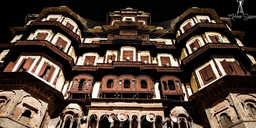 An exterior view of Rajwada in Indore, India, a famous tourist destination near Kheoni Wildlife Sanctuary.