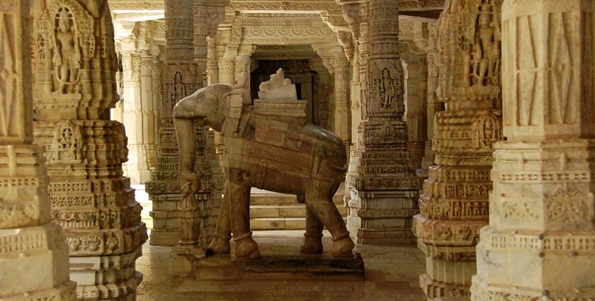 An inside view of a temple featuring a statue of elephant carrying God on its back.