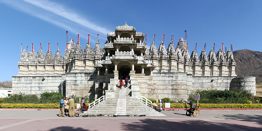 The fort features robust walls and bastions near Ranakpur Jain temple under clear blue sky