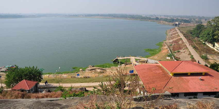 Serene view of the lake against the clear blue sky in the backdrop