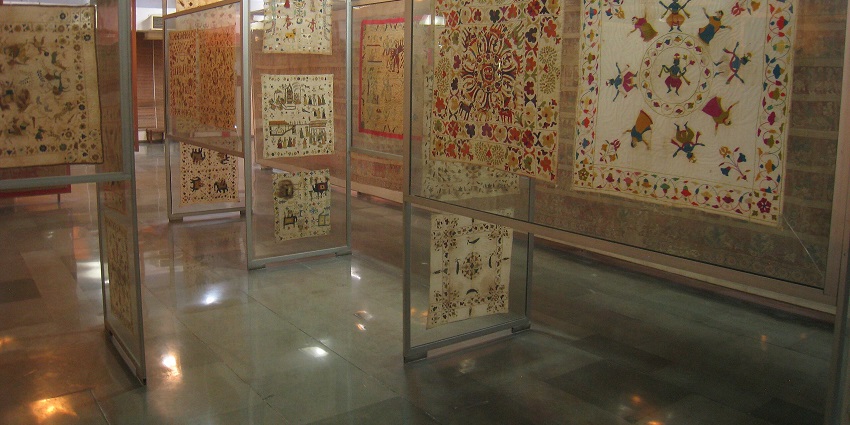 A glimpse of traditional prints and artistic designs featured inside a tourist hub.