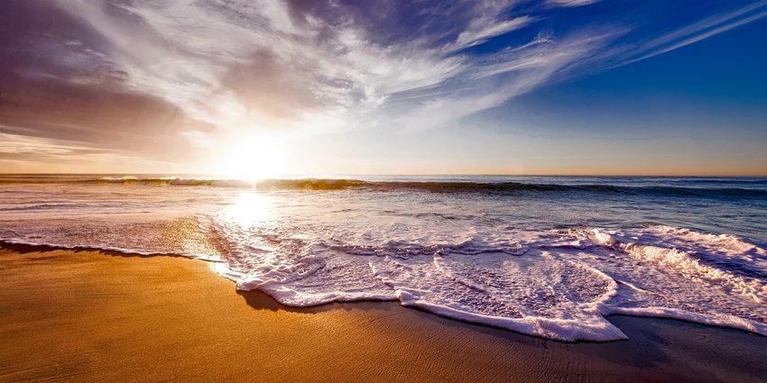 Quiet Rangaon Beach with soft sands, gentle waves, and peaceful coastal surroundings.