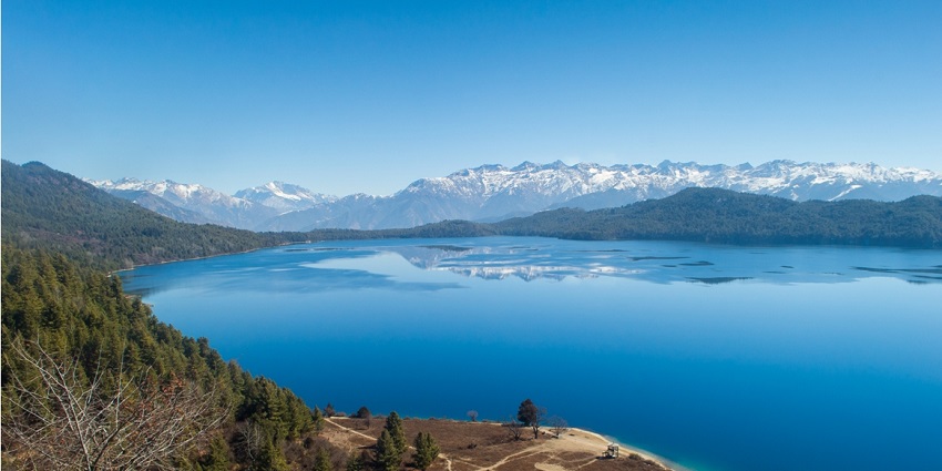 Stunning view of the Rara Lake, a serene and picturesque addition to nature's beauty.
