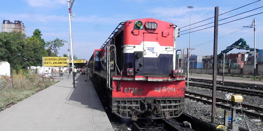 A YDM-4 locomotive with train number 52957 at Ratlam Junction, showcasing railway heritage.
