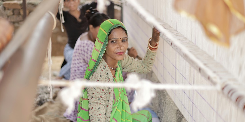 Traditional loom weaving at Rehwa Society, a popular spot near Kakanmath Temple.