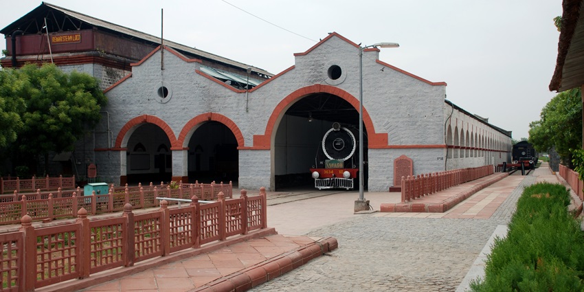 A historic railway museum showcasing vintage steam locomotives and India's railway heritage.