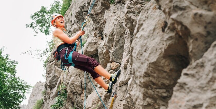 Go rock climbing in Manali with its lush green mountains, winding roads, and clear blue skies.