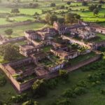 A beautiful aerial view of the Rohtasgarh Fort in Bihar, located amongst lush greenery.