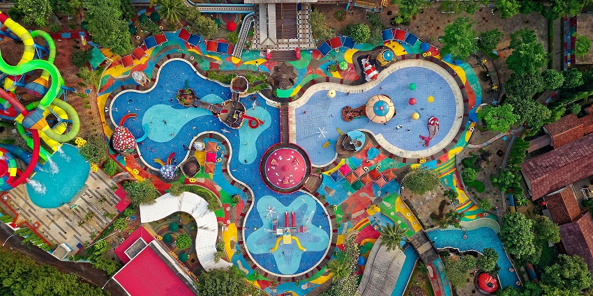 Panoramic aerial view of the thrilling colourful waterpark and is colourful settings