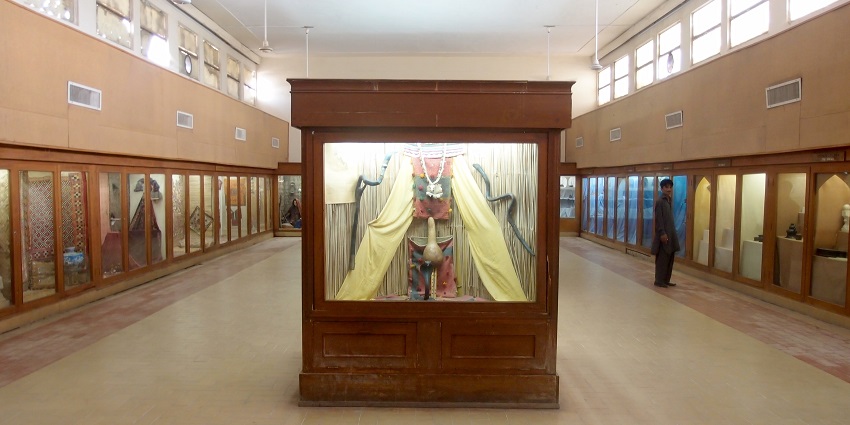 A man exploring the historical artifacts at Sadul Singh Museum in the city of Ganganagar