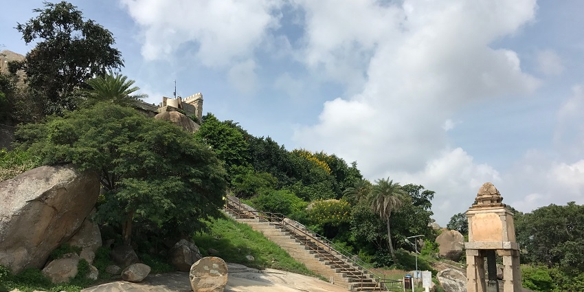 Scenic view of a serene spot surrounded by lush greenery, an ideal place for meditation