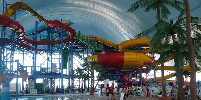 Colorful water slides inside Fallsview Water Park, Canada, with splash pools