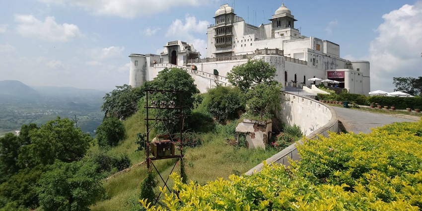 Sajjangarh Palace in Udaipur, a unique destination to visit Udaipur in October, perched on a hill.