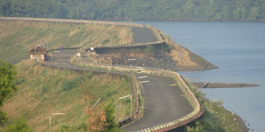 Majestic aerial views of the beautiful Salaulim Dam which is surrounded by the forest in Goa