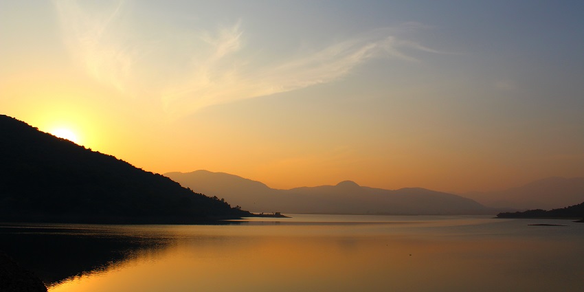 Panoramic yellow sunset view from the marvellous Salia Dam in Odisha