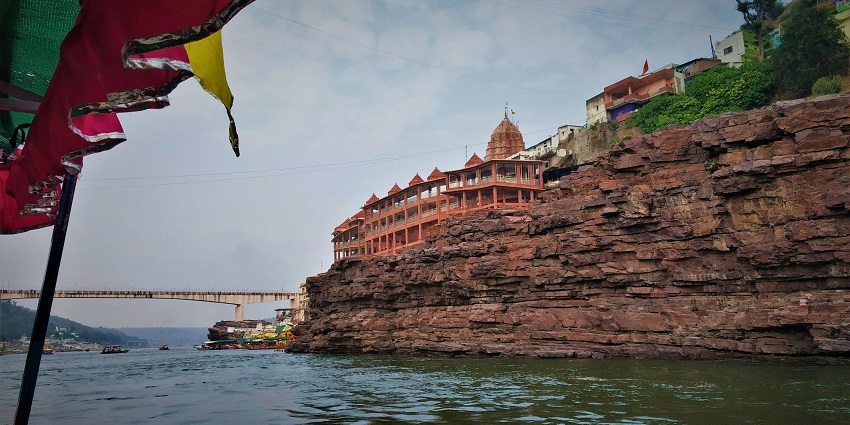 A glimpse of the Samarlakota Temple surrounded by azure waters in Andhra Pradesh.