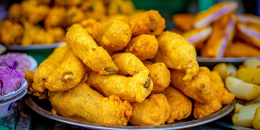 Street stall offers hot Mirchi Vada and crispy Kachoris, the famous food in Jaipur.