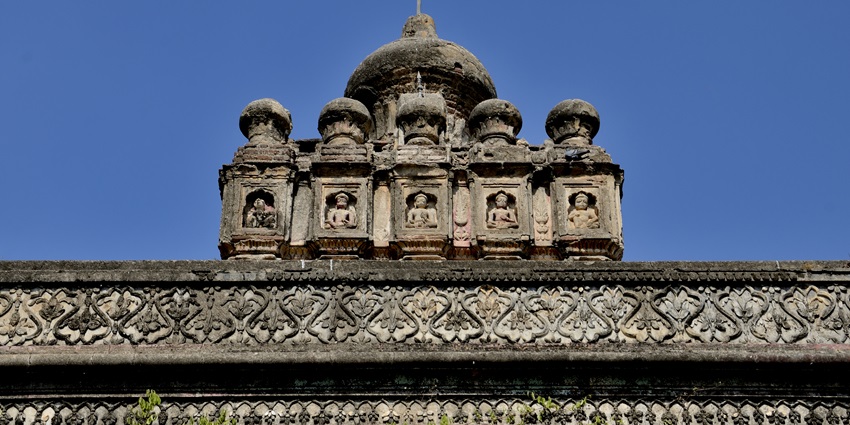 A frontal view of a historical Shiva temple in Andhra Pradesh with intricate carvings on its walls