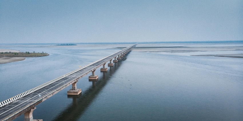 A glimpse of the Saraighat Bridge spanning the majestic waters of the Brahmaputra River.