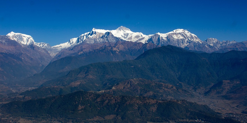 Panoramic view of the Sarangkot hills with the snow covered Himalayan ranges in the distance