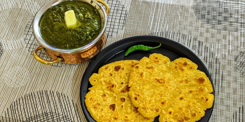 An image of Makki di Roti which is one of the delicious dishes to try on your next trip.